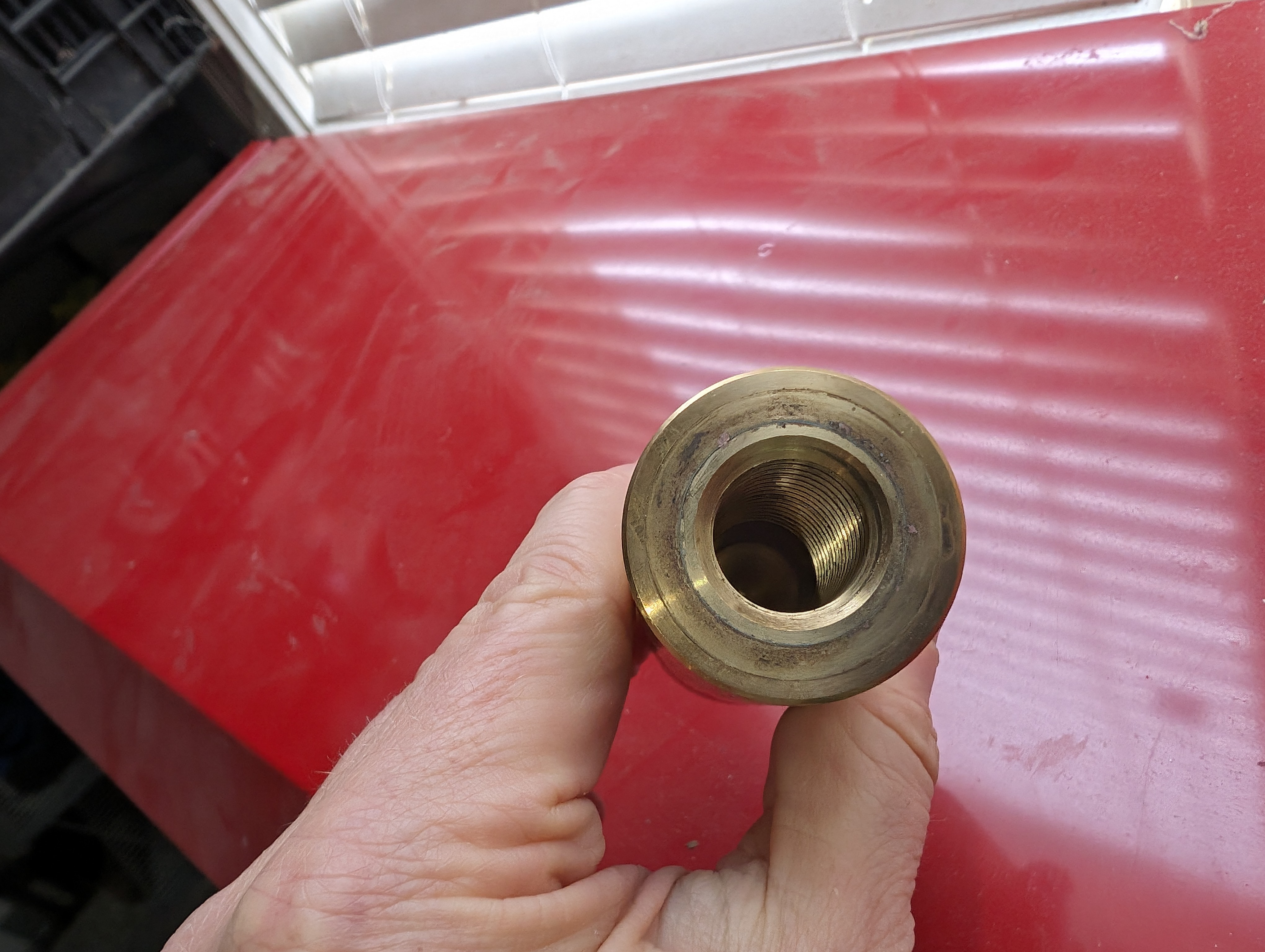 Eagle Engineering brass removable dangler tip showing internal screw threading