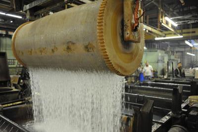 Plating barrel draining solution after immersion — open area determines how quickly this happens