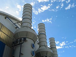 Industrial fume scrubbers for ventilation and corrosive fume control